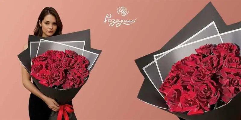 Огромный букет французских красных роз, фронтальный вид в руках у девушки